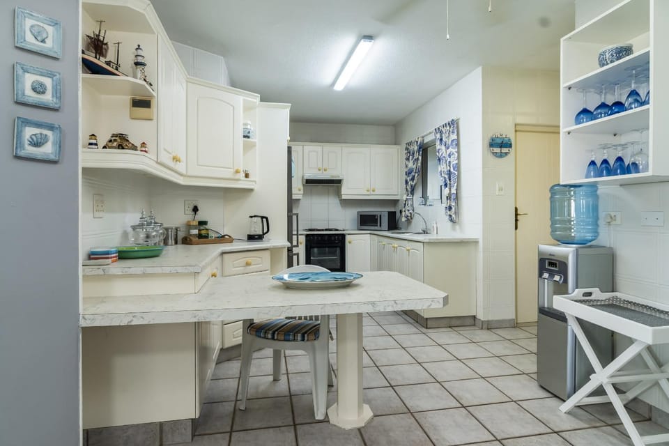 Kitchen or kitchenette, Dining area, dishwasher, oven, stove, toaster