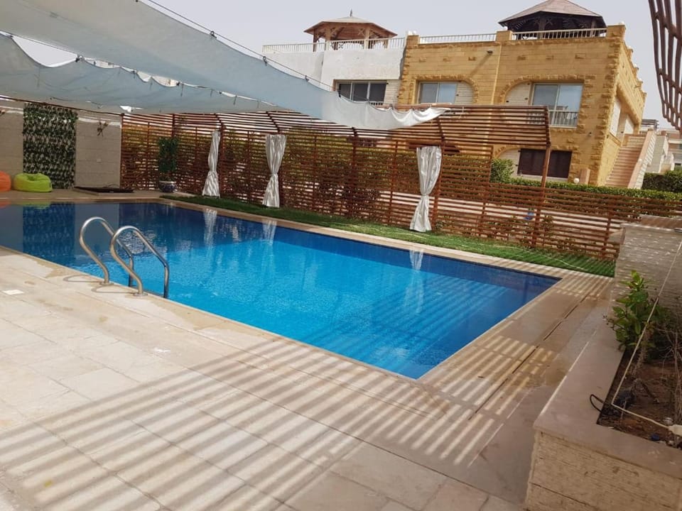 Seating area, Pool view, Swimming pool, sunbed