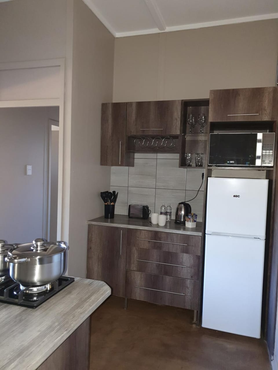 Kitchen or kitchenette, stove, toaster