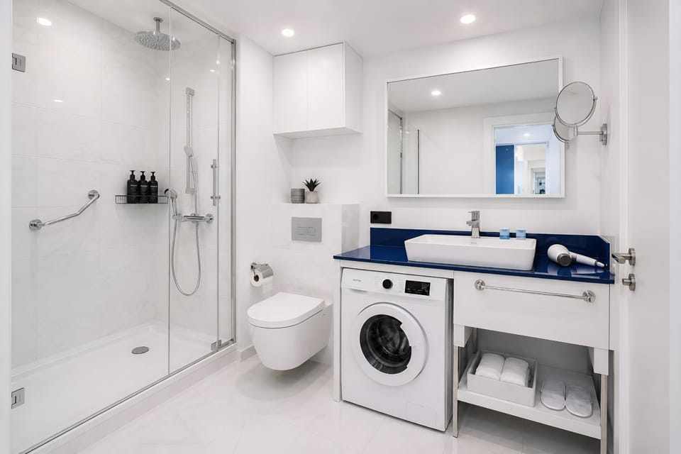 Shower, Bathroom, towels, washing machine, dryer