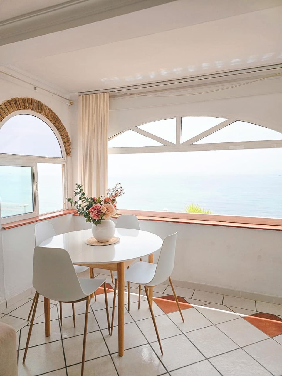 View (from property/room), Living room, Seating area, Dining area, Sea view