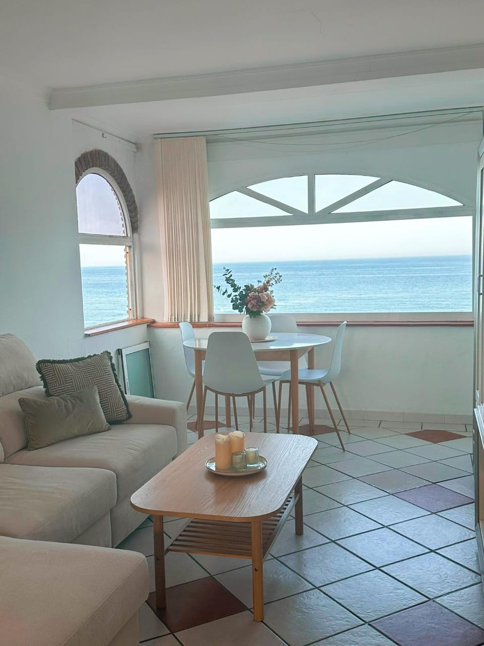 View (from property/room), Living room, Seating area, Dining area, Sea view