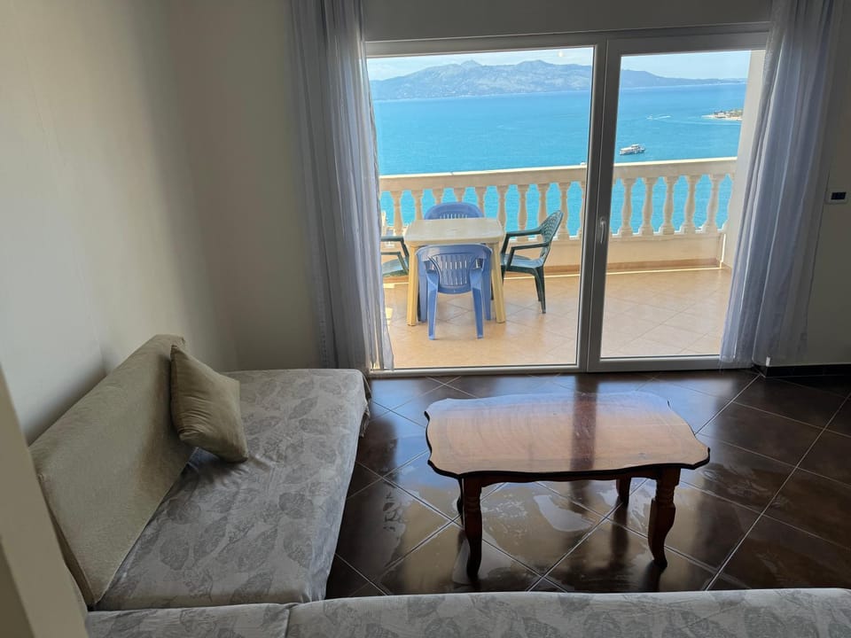 View (from property/room), Balcony/Terrace, Living room, Seating area, Sea view