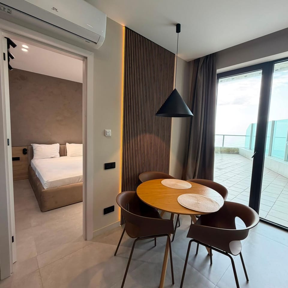 Bed, Seating area, Dining area, Bedroom