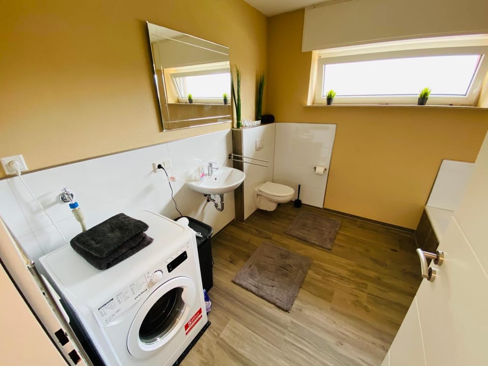 Bathroom, towels, washing machine