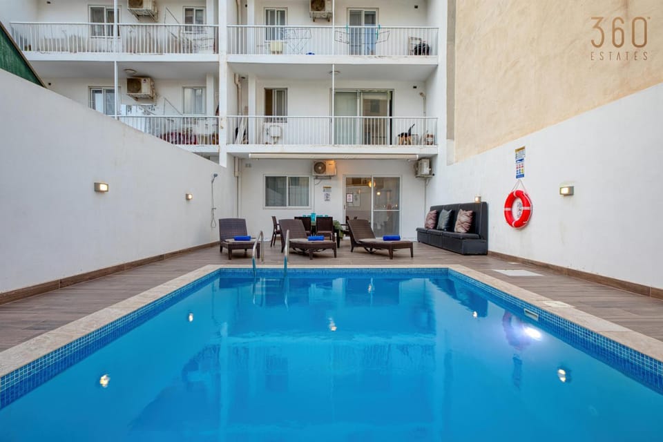 Living room, Seating area, Pool view, Swimming pool, sunbed