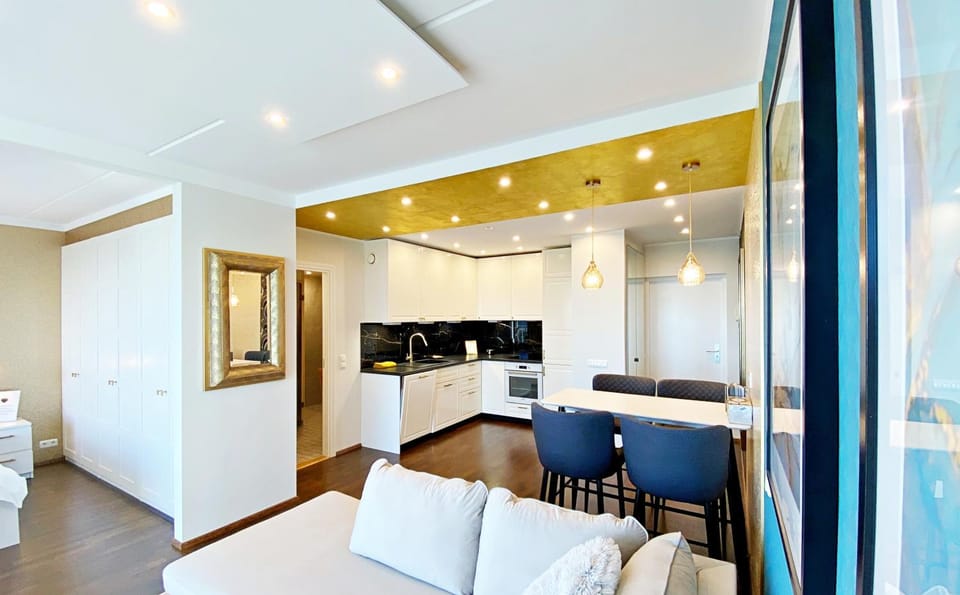 Kitchen or kitchenette, Living room, Seating area, Dining area
