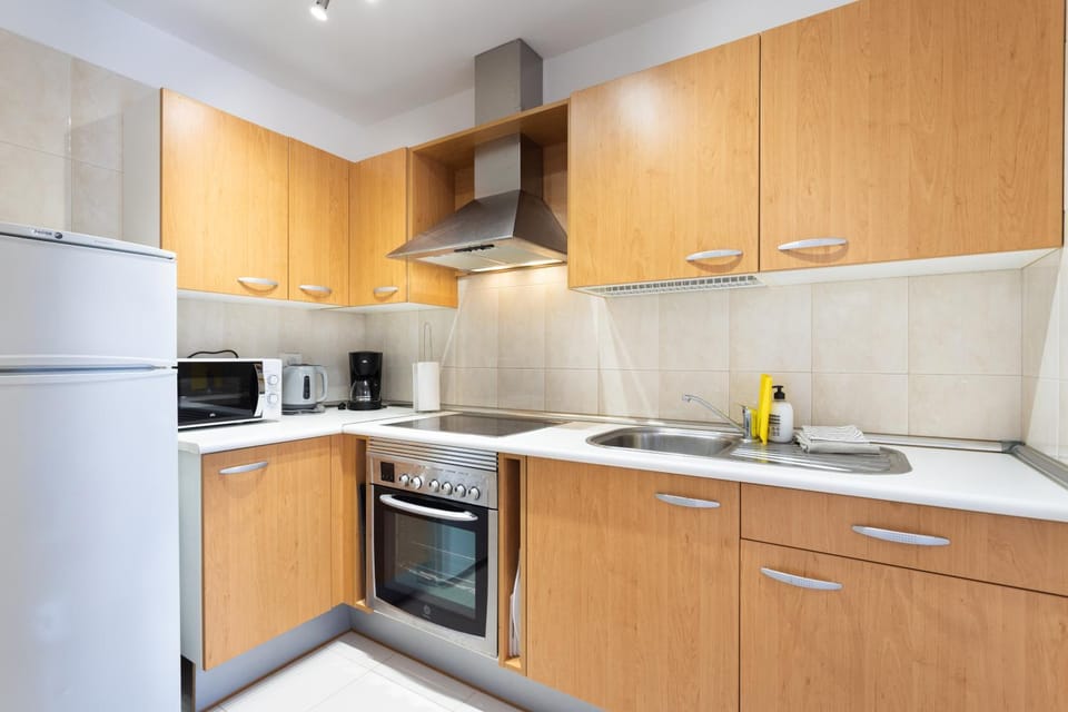 Kitchen or kitchenette, oven, stove, toaster