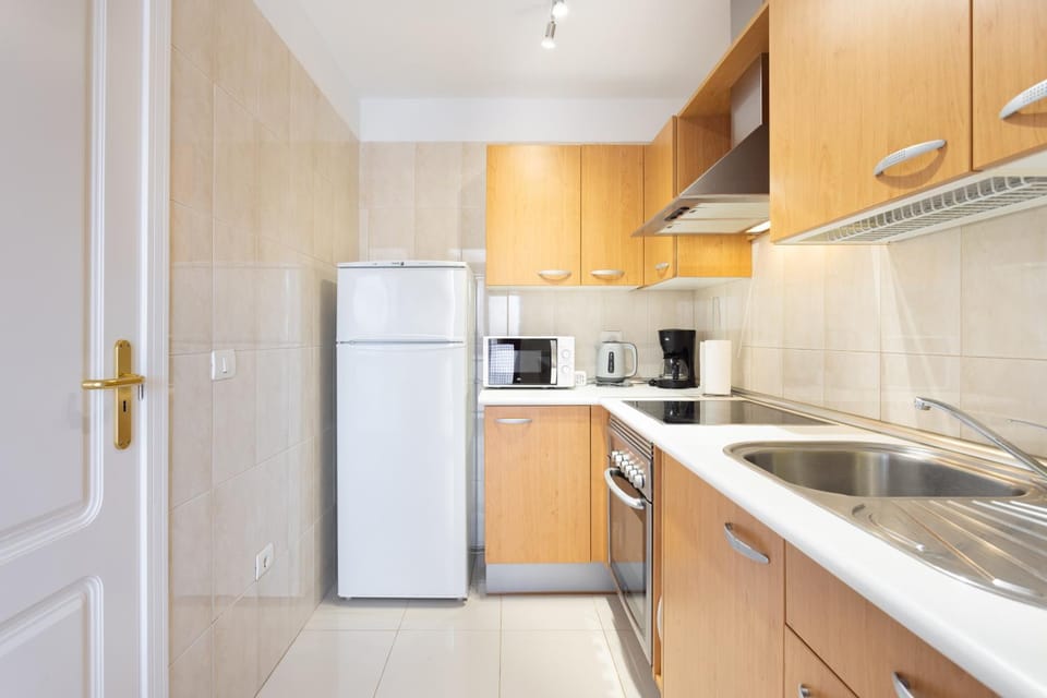 Kitchen or kitchenette, oven, stove, toaster