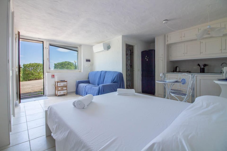 GuestHost - Cozy Open-Plan Apartment in Sardinia Apartment in Sardinia