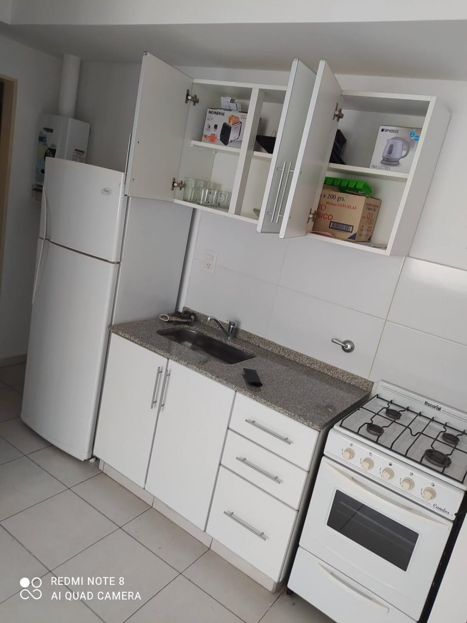 Kitchen or kitchenette, oven, stove