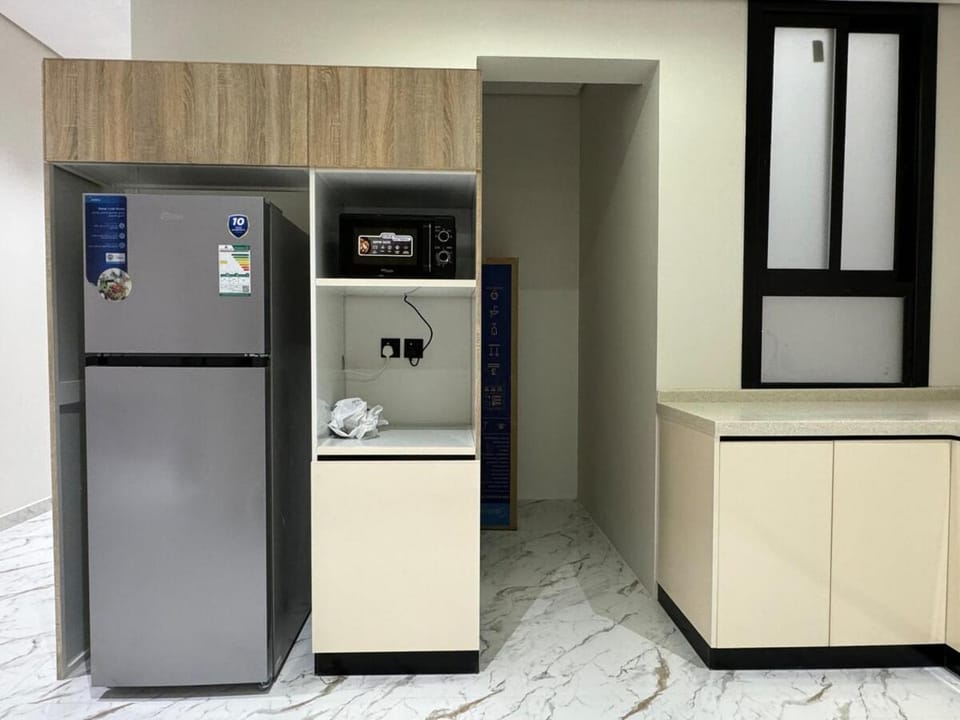 Kitchen or kitchenette, oven