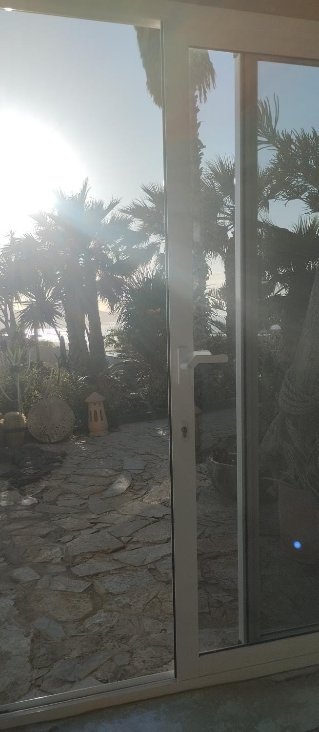 Stylish loft with views to cliffs, garden and beach of Famara Apartment in Isla de Lanzarote