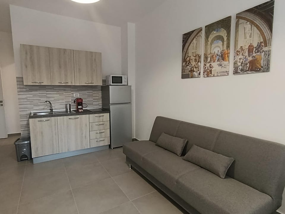 Kitchen or kitchenette, Living room, Seating area, oven, stove