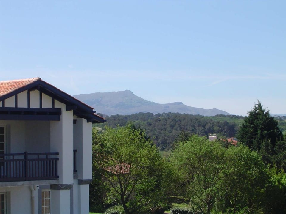 Property building, Natural landscape, Mountain view