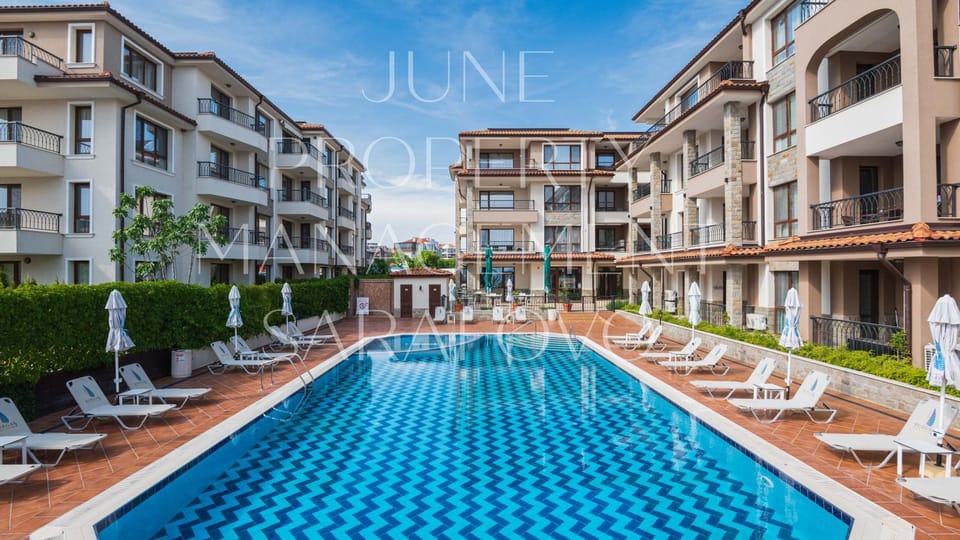 Property building, Day, Pool view, Swimming pool, sunbed