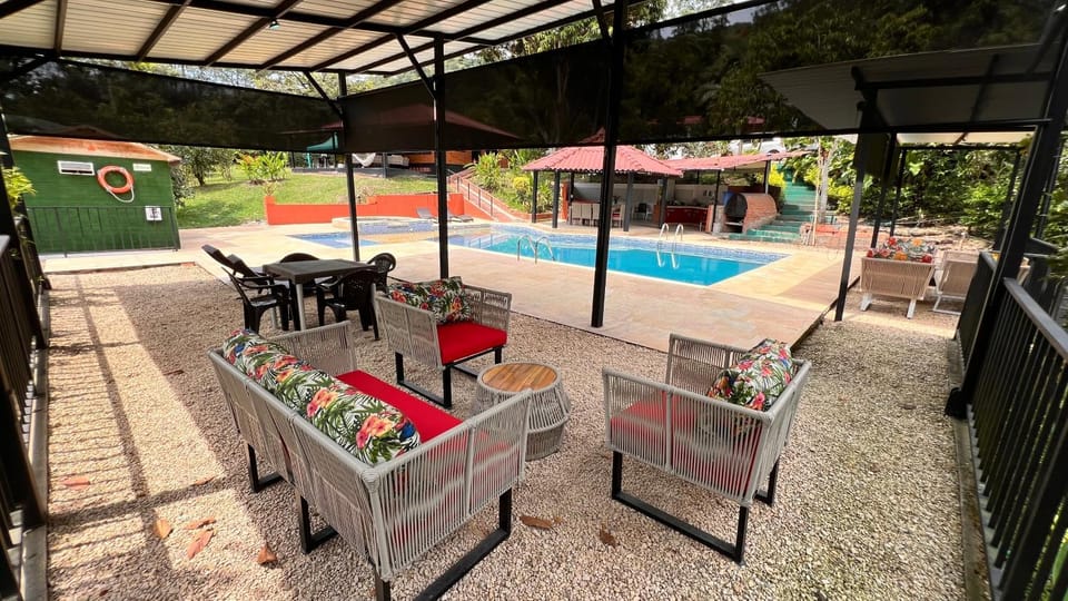 Patio, Communal lounge/ TV room, Day, Living room, Pool view, Swimming pool