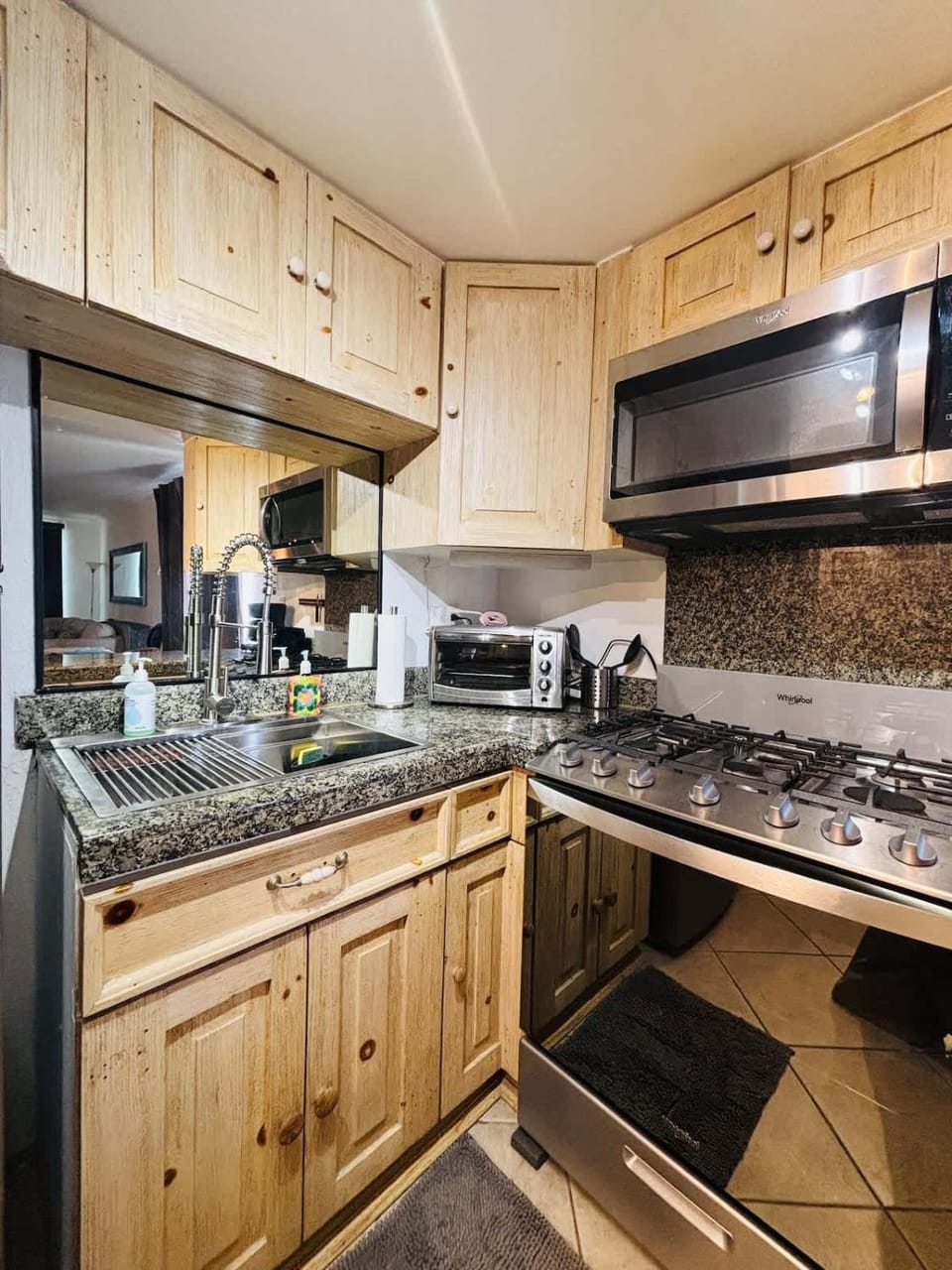Kitchen or kitchenette, microwave, stove