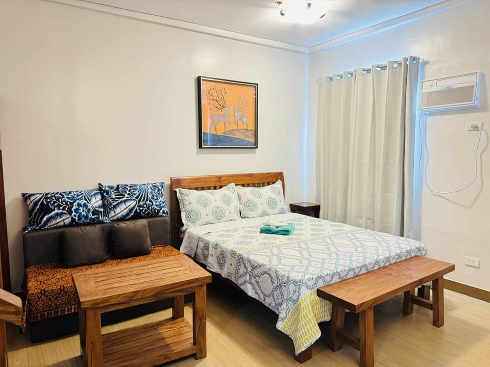 Bed, Seating area, Bedroom