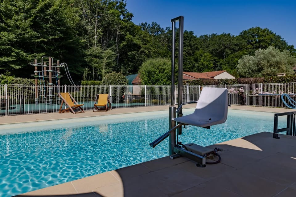 Property building, Living room, Swimming pool
