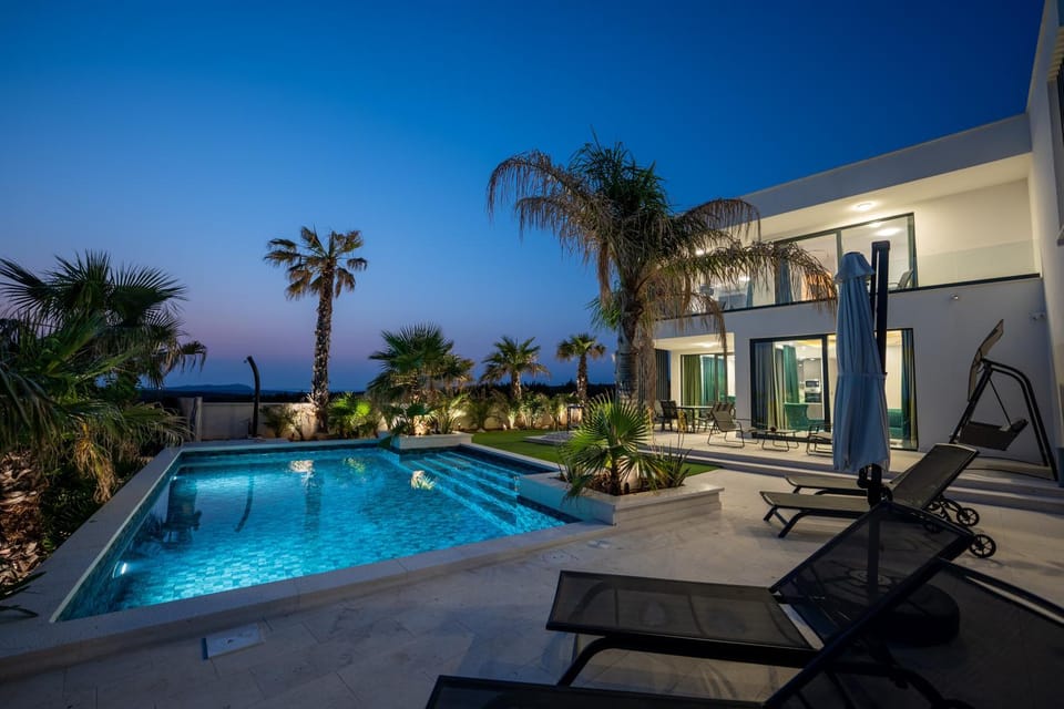 Property building, Patio, Night, Swimming pool