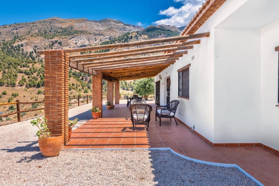 Property building, Patio, Spring, Day, Natural landscape, View (from property/room), Balcony/Terrace, Dining area, Mountain view