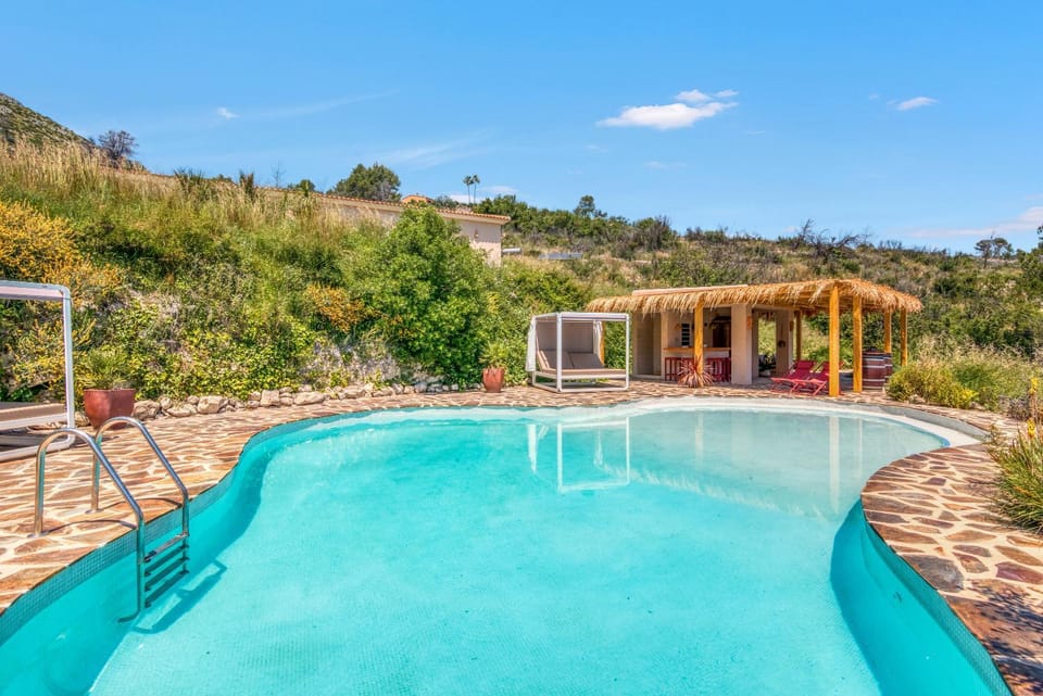 Property building, Living room, Swimming pool