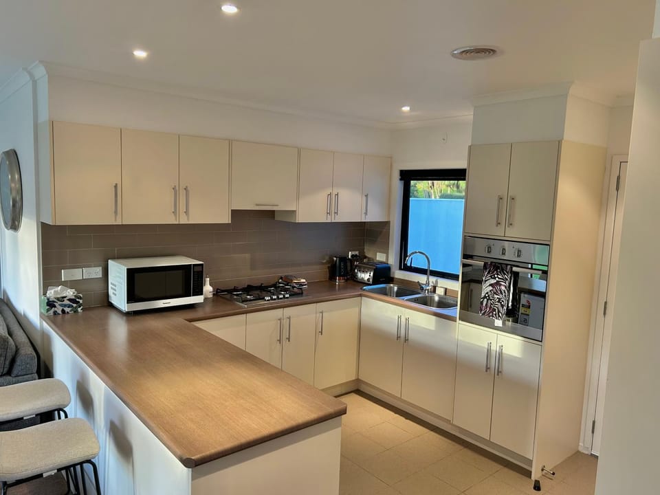 Kitchen or kitchenette, oven, stove