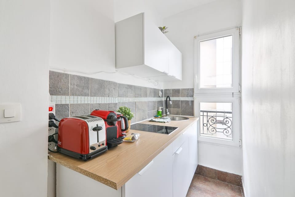 Kitchen or kitchenette, stove, toaster
