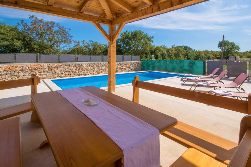 Patio, Day, Pool view, Swimming pool, sunbed