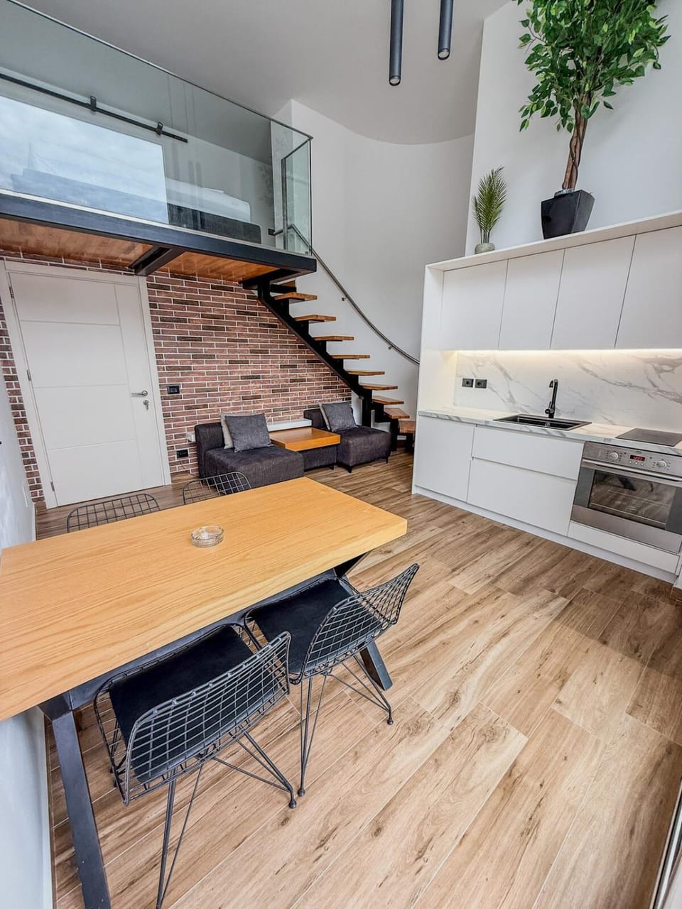 Kitchen or kitchenette, Living room, Seating area, Dining area