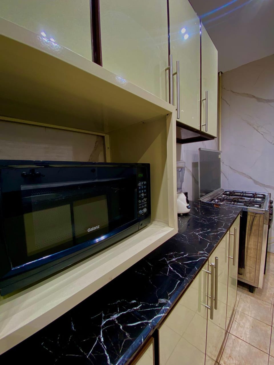 Kitchen or kitchenette, stove