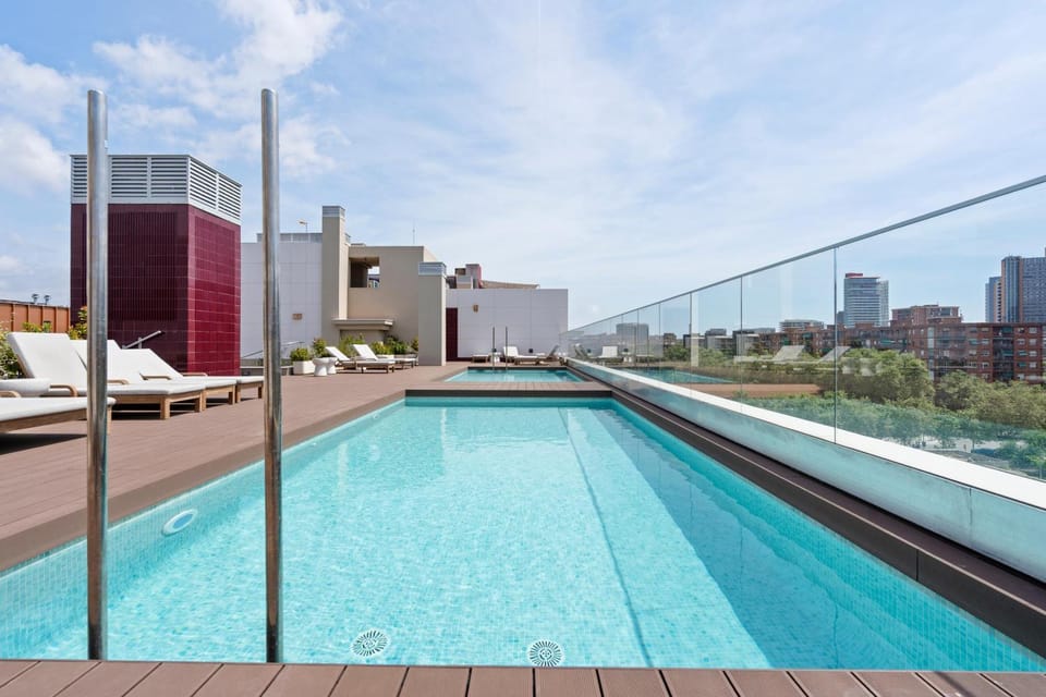 Monthly 32 Nights 1BR Pools Parking Apartment in Barcelona