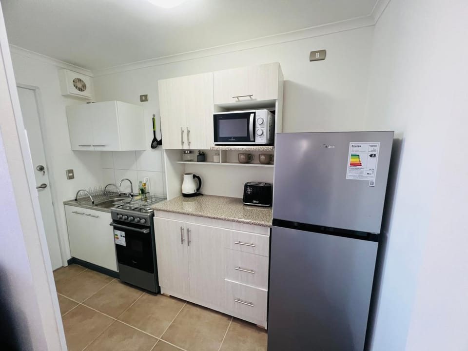 Kitchen or kitchenette, oven, stove, toaster