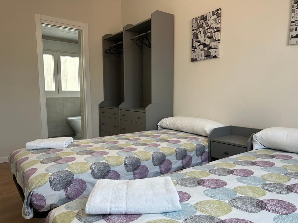 Bed, Photo of the whole room, Bedroom, towels, wardrobe
