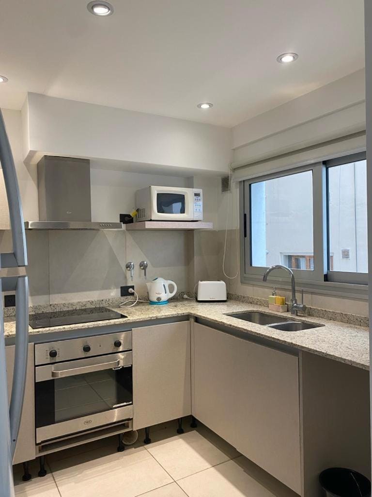 Kitchen or kitchenette, oven, toaster