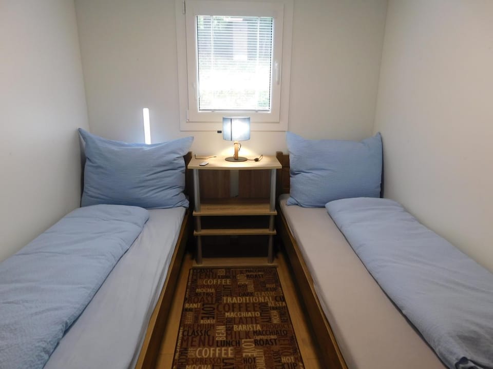 Photo of the whole room, cot