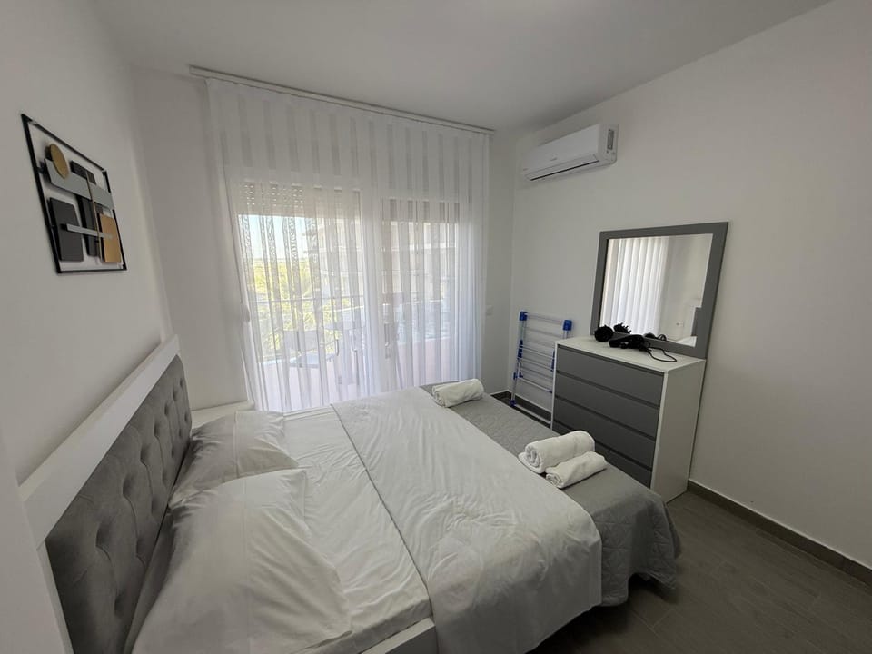 Bed, Bedroom, towels, wardrobe, air conditioner
