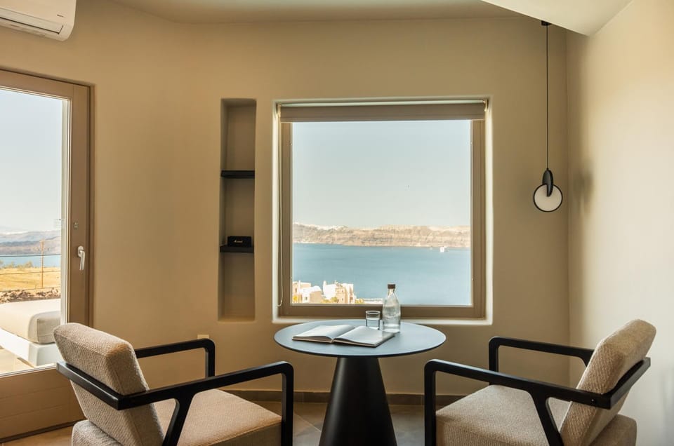 Natural landscape, View (from property/room), Living room, Seating area, Sea view