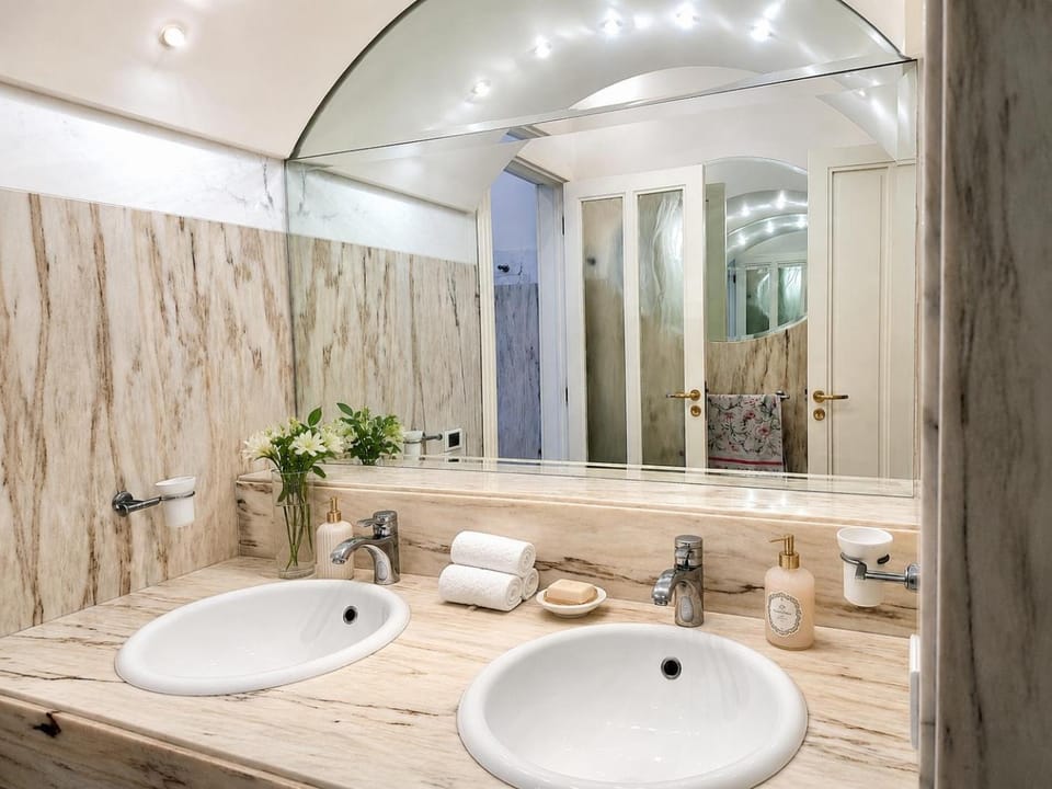 Toilet, Bathroom, hair dryier, towels