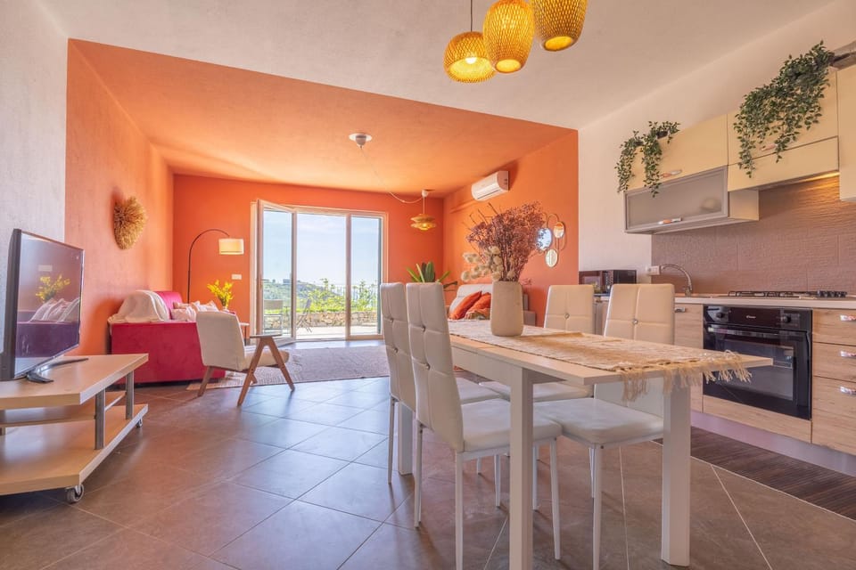 TV and multimedia, Kitchen or kitchenette, Living room, Seating area, Dining area, oven, stove