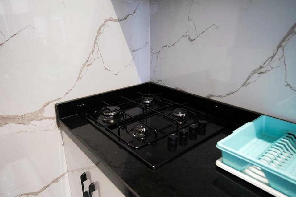 Kitchen or kitchenette, stove