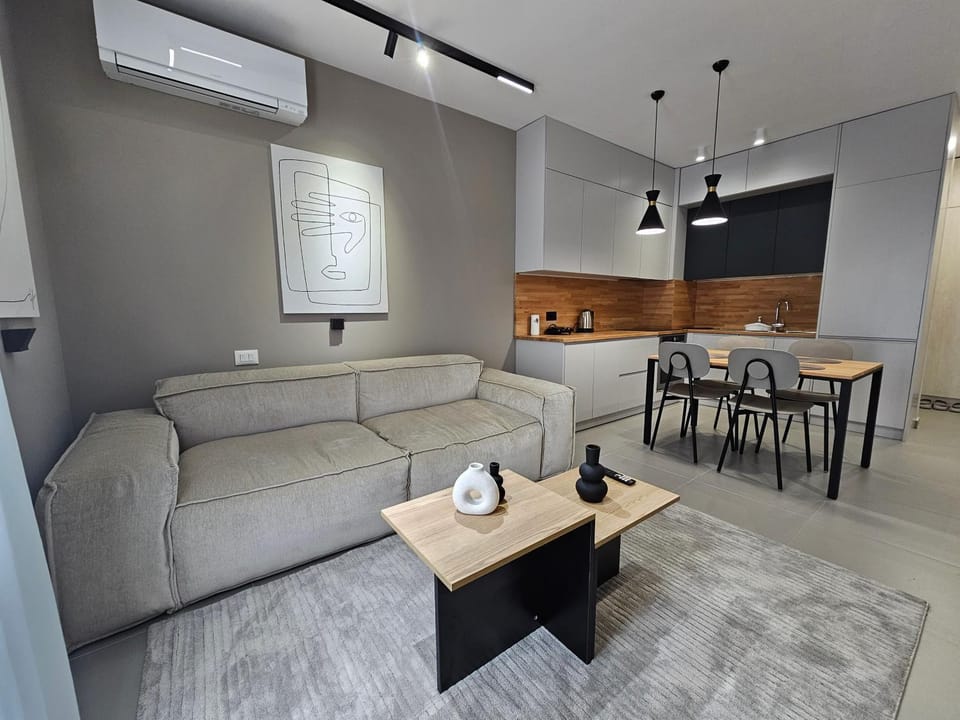 Kitchen or kitchenette, Living room, Seating area, Dining area, air conditioner