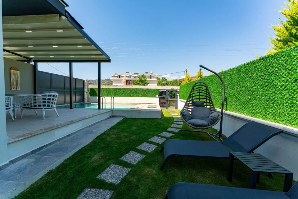 Patio, Day, Garden, Balcony/Terrace, Seating area, Garden view, Pool view, Swimming pool, sunbed