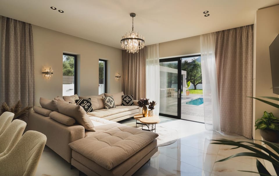 Living room, Seating area, Pool view