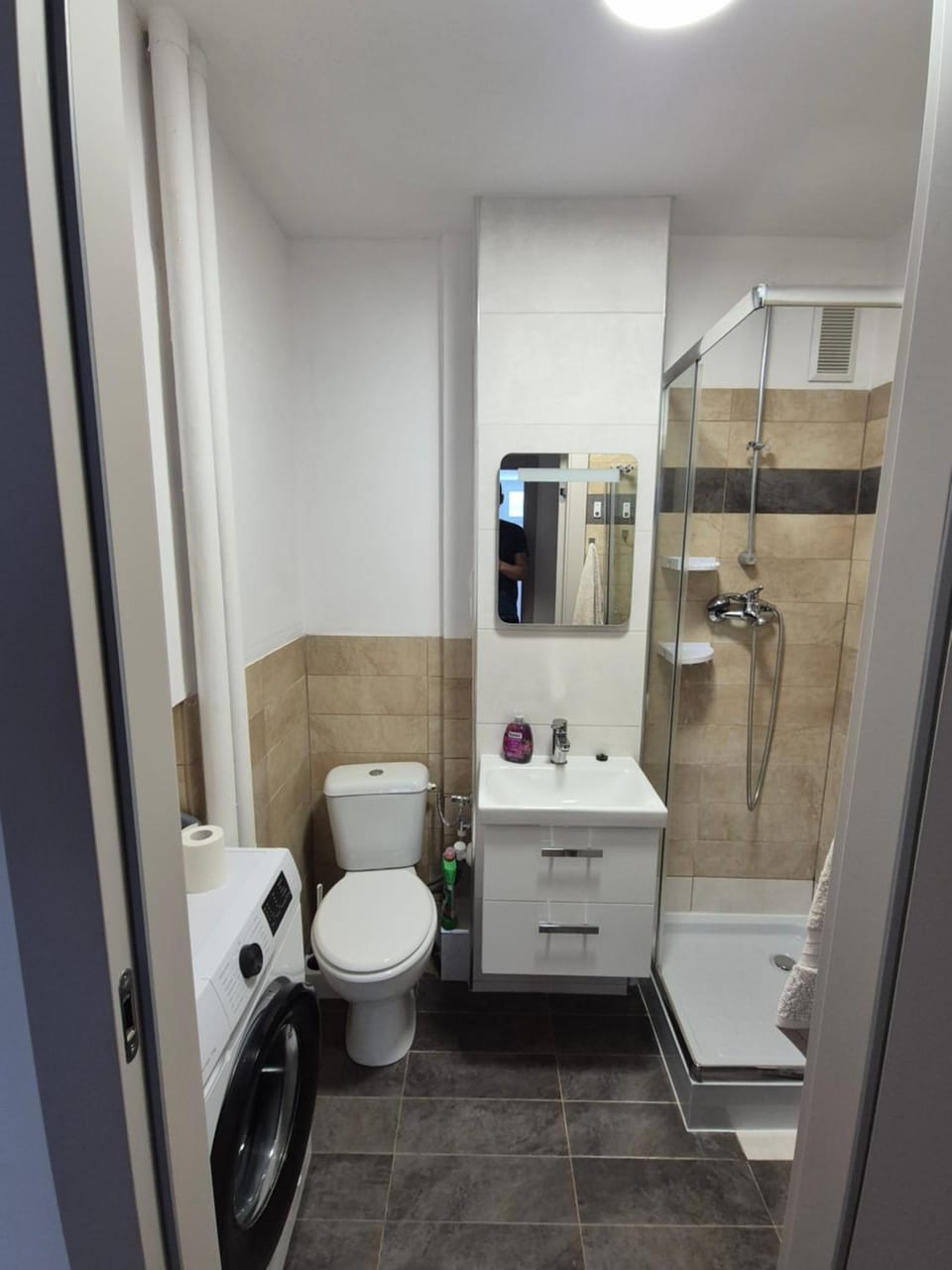 Toilet, Bathroom, towels, washing machine, dryer