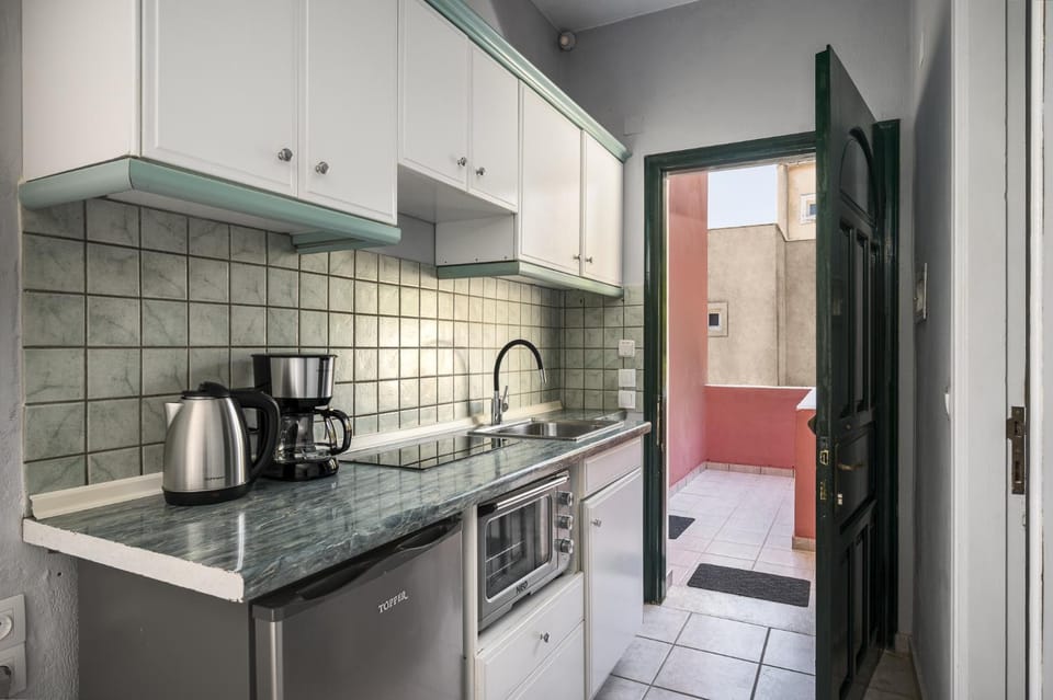 Kitchen or kitchenette, stove
