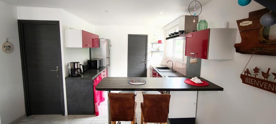 Kitchen or kitchenette, dishwasher, oven, stove