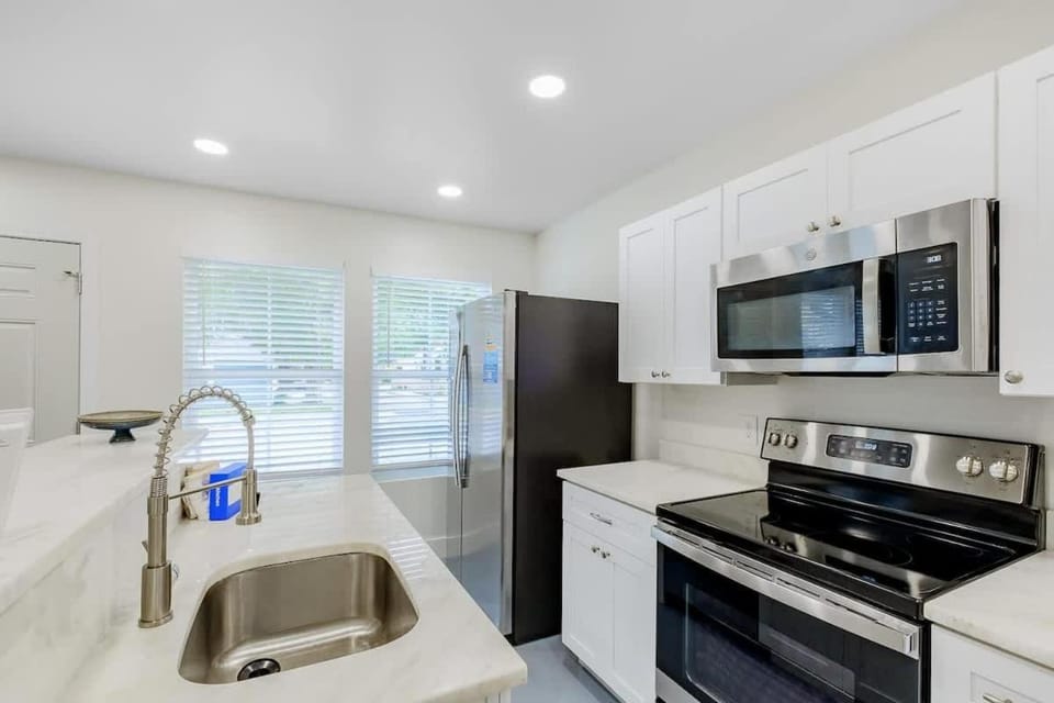 Kitchen or kitchenette, dishwasher, oven, stove, kitchen