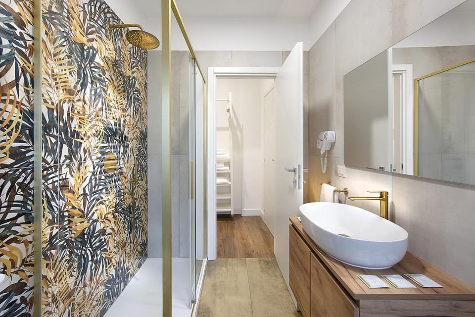 Shower, Toilet, Bathroom, hair dryier, towels